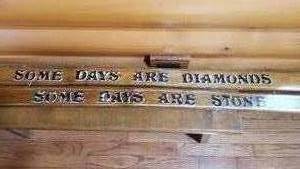 lot 2402 image: Wooden Nordic Skis with Words of Wisdom