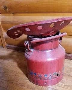 lot 210 image: Petite Old Farmhouse Milk Can with Tractor Seat  Painted Red with Red