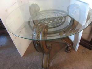 Round occasional table with beveled...
