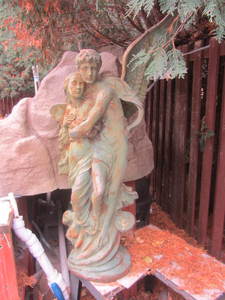 Metal garden sculpture, couple appr...