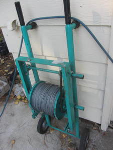 Steel cable on roller dispenser...