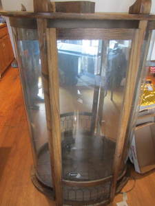 Curved glass china cabinet with lea...