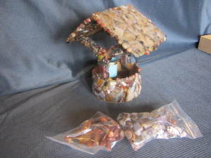 Wishing well covered with agates, t...