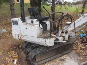 Melroe Bobcat mini excavator  back...