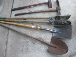 Post hole digger, spade, sand shove...