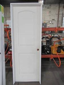 lot 607 image: Masonite 28 in. x 80 in. Roman 2-Panel Round Top Left-Handed Hollow-Core Smooth Primed Composite Single Prehung Interior Door, 10966 - Some slight scratches