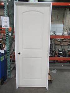lot 608 image: Masonite 30 in. x 80 in. Roman 2-Panel Round Top Right-Handed Hollow-Core Smooth Primed Composite Single Prehung Interior Door - Some slight scratches.