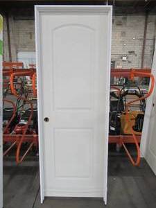 lot 609 image: Masonite 28 in. x 80 in. Roman 2-Panel Round Top Right-Handed Hollow-Core Smooth Primed Composite Single Prehung Interior Door - Some slight scratches.