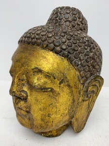 lot 2 image: Antique Carved Gilt Stone Buddha Head Sculpture