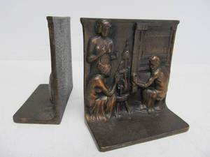 lot 74 image: Antique Bronze Finish Cast Iron Bookends