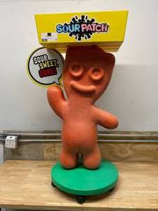 lot 27 image: SOUR PATCH Candy Display on Wheels