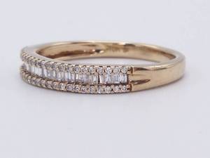 lot 31 image: Bright Baguette and Round Cut Diamond Estate Ring in Yellow Gold $1299