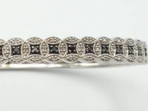 lot 35 image: Black Diamond Bangle Estate Bracelet $750