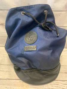 lot 19 image: Versace Parums Drawstring Bucket Backpack Bag