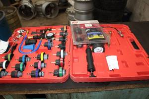 lot 32 image: Lisle Cooling System Pressure Tester Set and Compression Leak Detector 75500