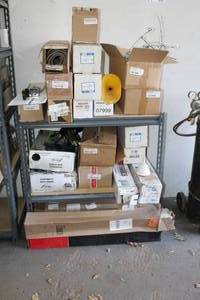 lot 143 image: Tire Chains, Dash Mats, Seat Covers, HoodDoor Guards, Ball Mount, Misc. Auto Parts