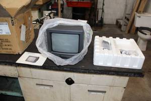 lot 167 image: Audiovox Mni 10 Color TV AVT-975 with Remote Control