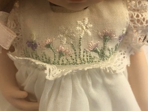 lot 37 image: Paulines Doll with Wooden Stand