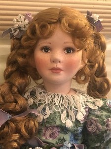 lot 21 image: Marie Osmond Doll