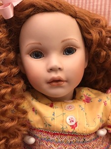 lot 86 image: Pauline Porcelain Doll with Pretty Red Curls