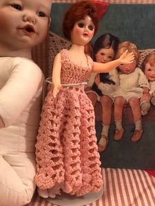 lot 113 image: Yolanda Bello Porcelain Doll and Childrens Wall Hangings
