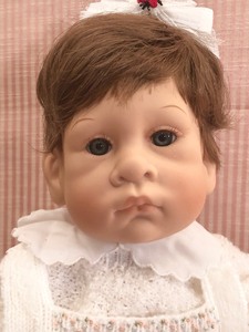 lot 122 image: Julie Good-Krueger Doll with a White Sweater and Leggings