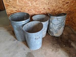 lot 562 image: (4) Galvanized Trash Cans