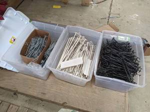 lot 642 image: (3) Totes of Assorted Peg Hooks & Brackets