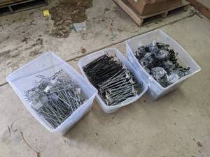 lot 645 image: (3) Totes of Assorted Peg Hooks & Brackets