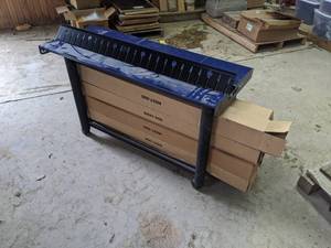 lot 646 image: Rolling Sylvania Cart with (11) Cases of Model N827-500 Brackets