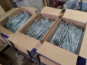 lot 649 image: (3) Cases of Peg Hooks