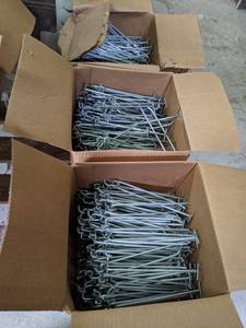 lot 651 image: (3) Cases of Peg Hooks