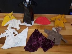 lot 60 image: Vintage Barbie Coats & Jackets