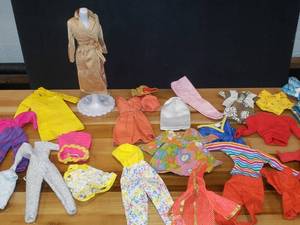 lot 12 image: Great Lot of Black Label Barbie Clothes & Case