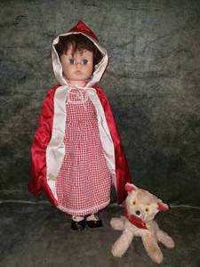 lot 107 image: 22 Little Red Riding Hood Doll and Mohair Wolf