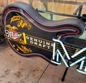lot 119 image: Miller Genuine Draft Guitar Shaped Neon Sign
