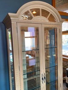 lot 12 image: Blonde Wood Double Door Glass Lighted Display Cabinet