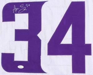 lot 23 image: Andrew Sendejo Signed Vikings White Jersey (JSA COA)