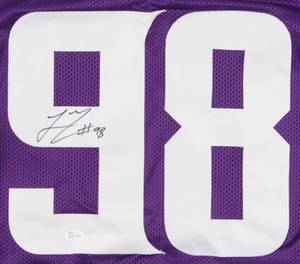 lot 20 image: Linval Joseph Signed Vikings Purple Jersey (JSA COA)