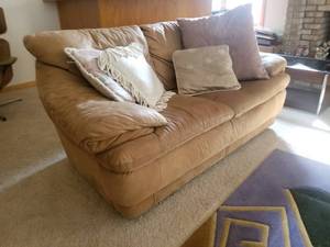 lot 328 image: Tan Leather Loveseat