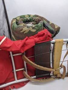 lot 110 image: Vintage Camo Sleeping Bag and High Adventure External Frame Backpack