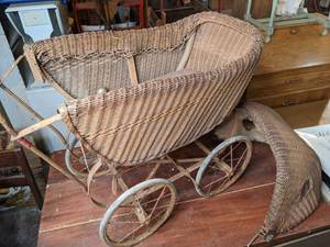 lot 142 image: Antique Wicker Baby Buggy with Metal Frame