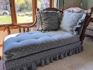 lot 300 image: Vintage Wood Daybed with Floral Upholstery and Pillows.