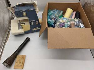 lot 41 image: White Superlock Vintage Serger plus Assorted Sewing Supplies
