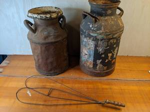 lot 12 image: Pair of Antique Metal Milk Cans & Rug Beater