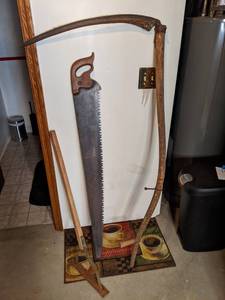lot 102 image: Wood Handled Scythe and Hand Saw