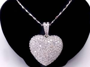 lot 4 image: Masterpiece Approximately 3.00 Carat Very Fine Pave Diamond Heart Pendant in 18k White Gold $19,750 Retail