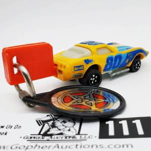 lot 111 image: Vintage Kidco 1980 Burnin Key Car Devil County CORVETTE #80 Yellow & Blue w LAUNCH Key 164