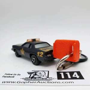 lot 114 image: Vintage 1980 Kidco Devil County Sheriff Burnin Key Car 164 w Launch Key