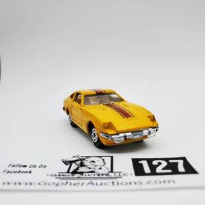 lot 127 image: Vintage Yatming DATSUN 280Z-T, (#1052) Yellow, Opening Doors